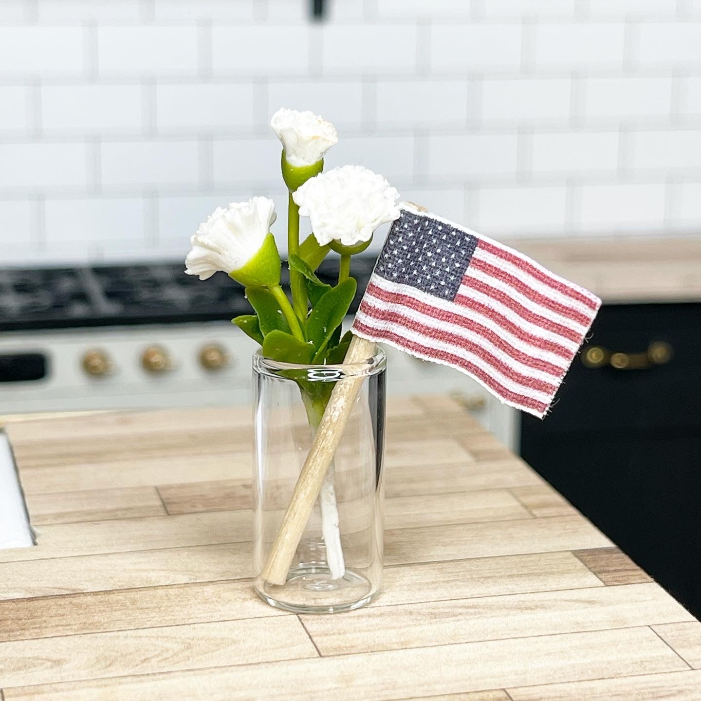 Carnations with Flag and Glass Vase