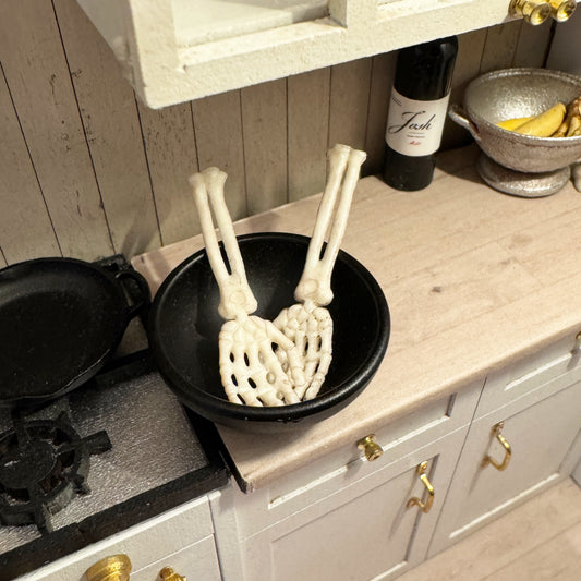 Bowl with Skeleton Hand Utensils